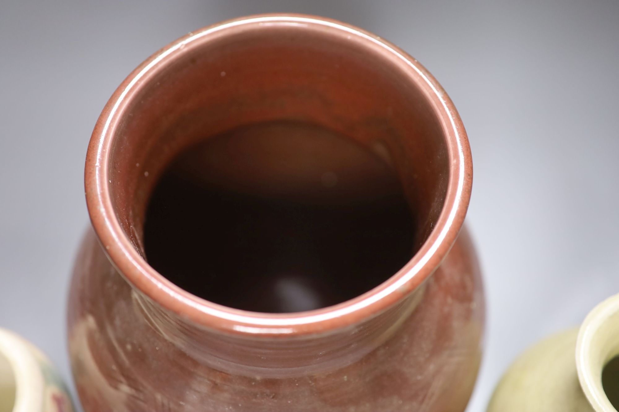 James Walford (1913-2003). An incised red glazed vase and two others, impressed marks, tallest 28cm